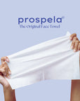 Disposable face towel held